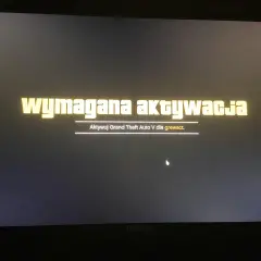 Ekran gry z napisem "Wymagana aktywacja" i tekstem "Aktywuj Grand Theft Auto V dla grewsc.t".
